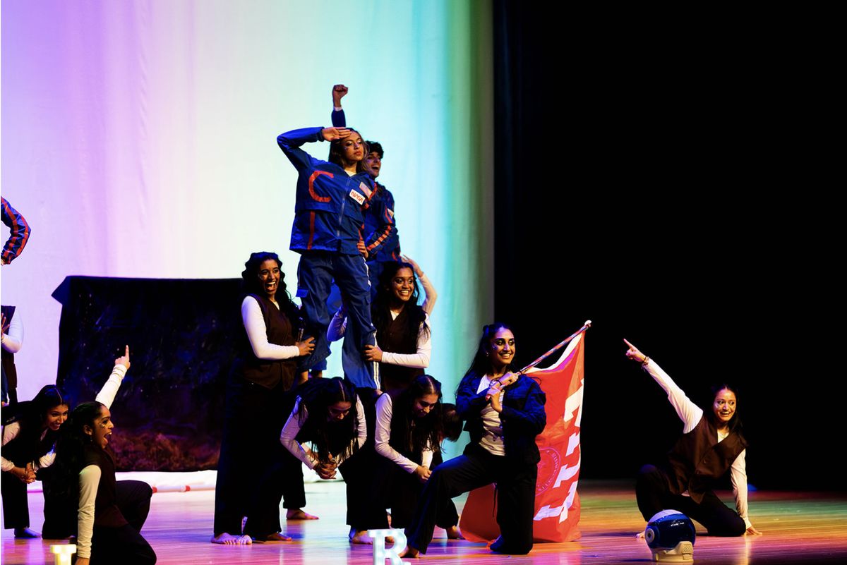 Bollywood Fusion team performing on stage