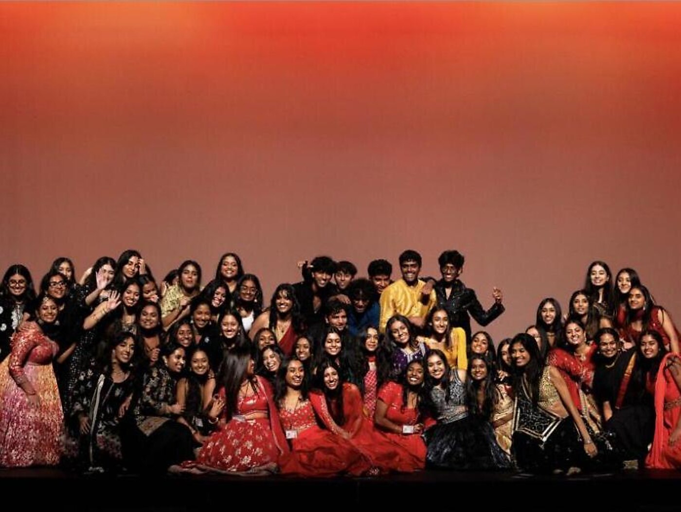 Chak De C'ville dancers on stage